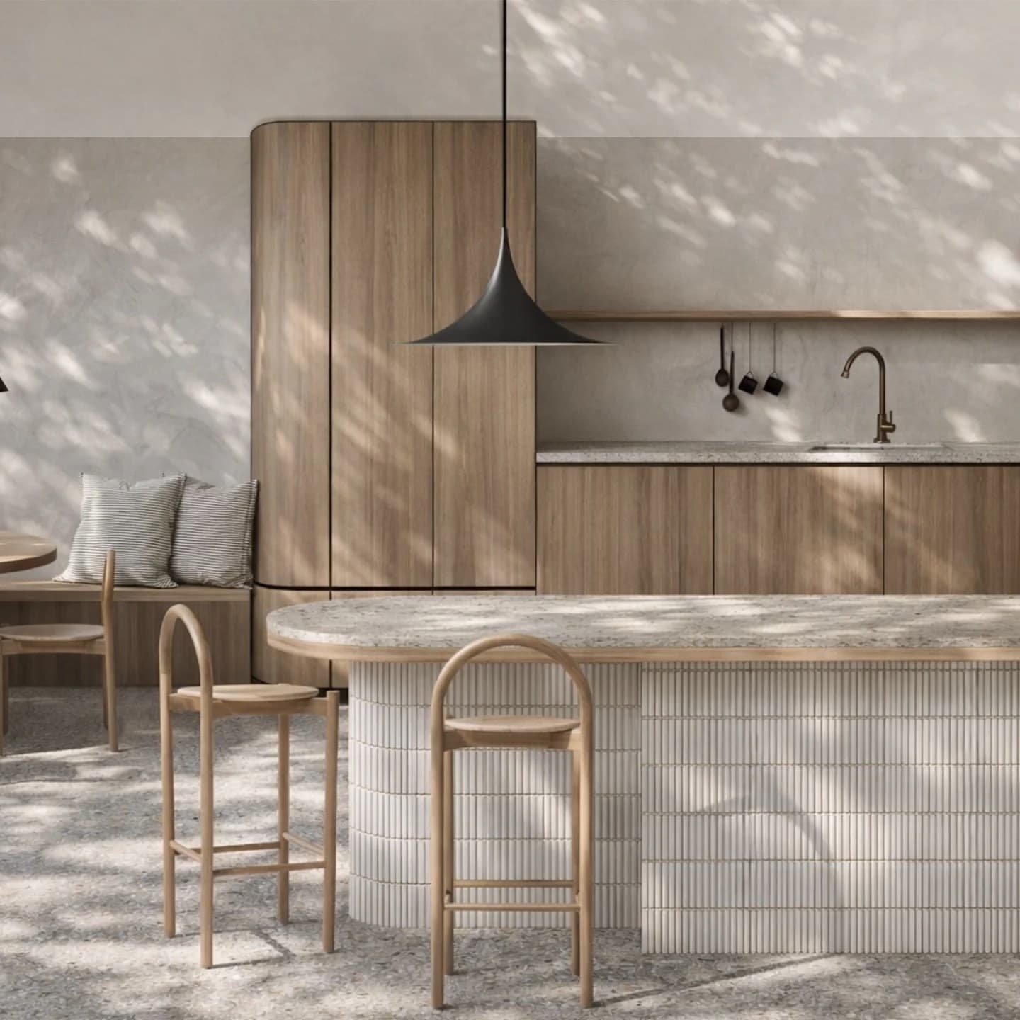 Kitchen with oak joinery, a curved island clad in fluted handmade tile, a travertine benchtop and arched timber bar stools